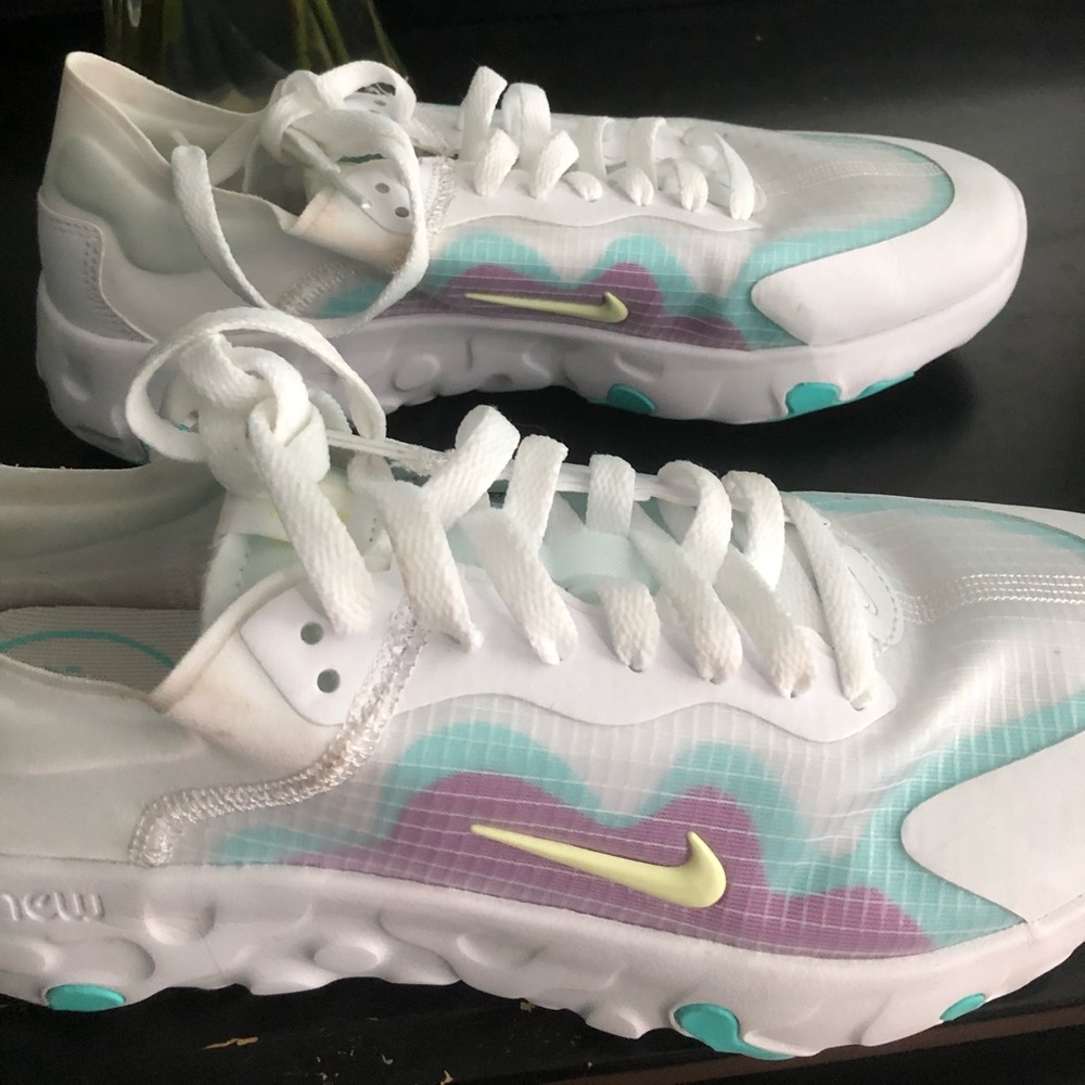 White, green, purple Nike tennis shoes. Never worn